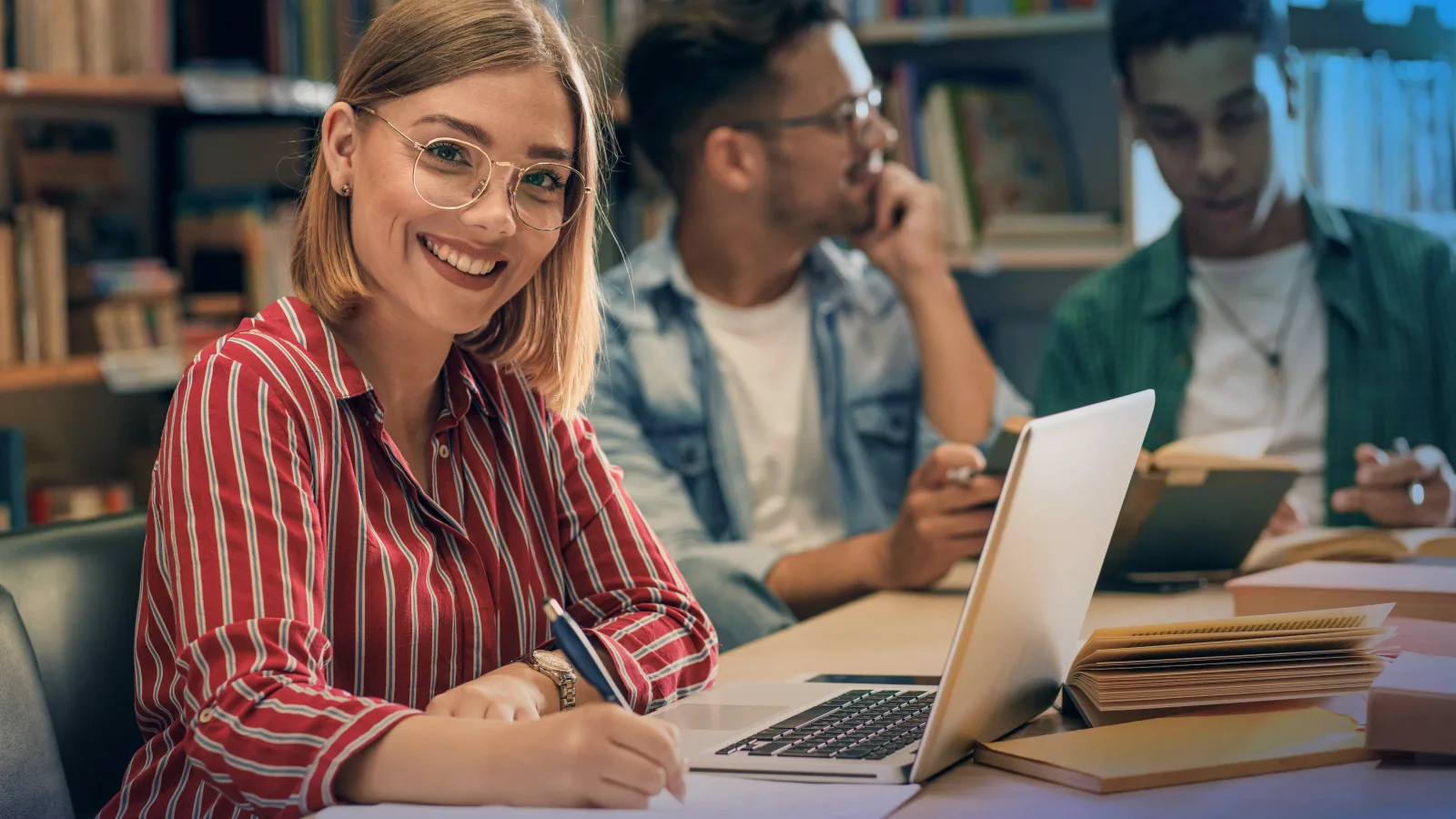 A student working through a self paced 3DEXPERIENCE course on a laptop